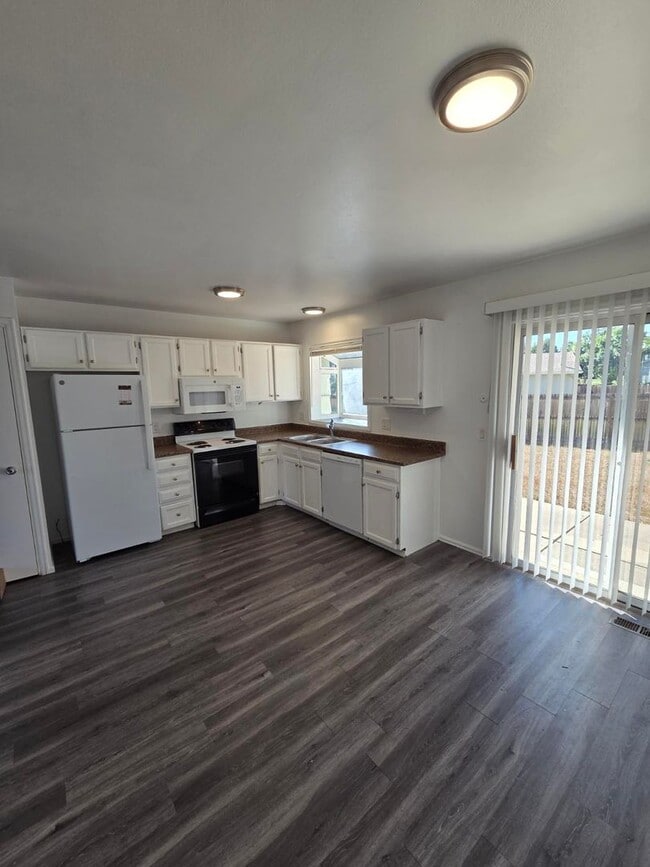 Photo - Inviting 3-Bedroom Home with Expansive Backyard on a Peaceful Cul-de-Sac | Available July 10