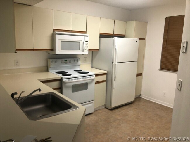 8781 Wiles Rd Unit 201