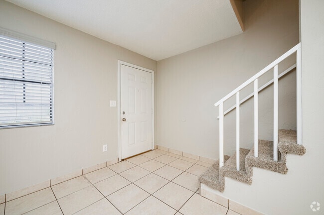 2 BR, 1.5 BA - 1050 SF - Entrance - The Palms at Daytona