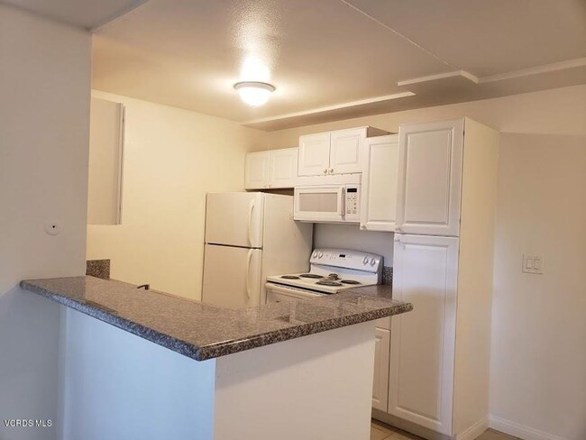 Photo - Desirable lower level 2+1 in gated community