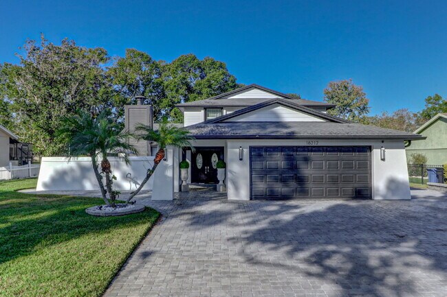 Building Photo - Fully Furnished 4-Bedroom Pool Home with Golf Course Views in Northdale
