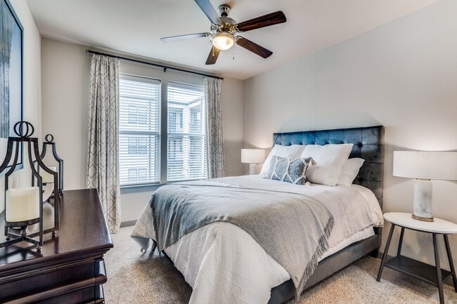 large bedroom with queen size bed and natural light - Junction 15