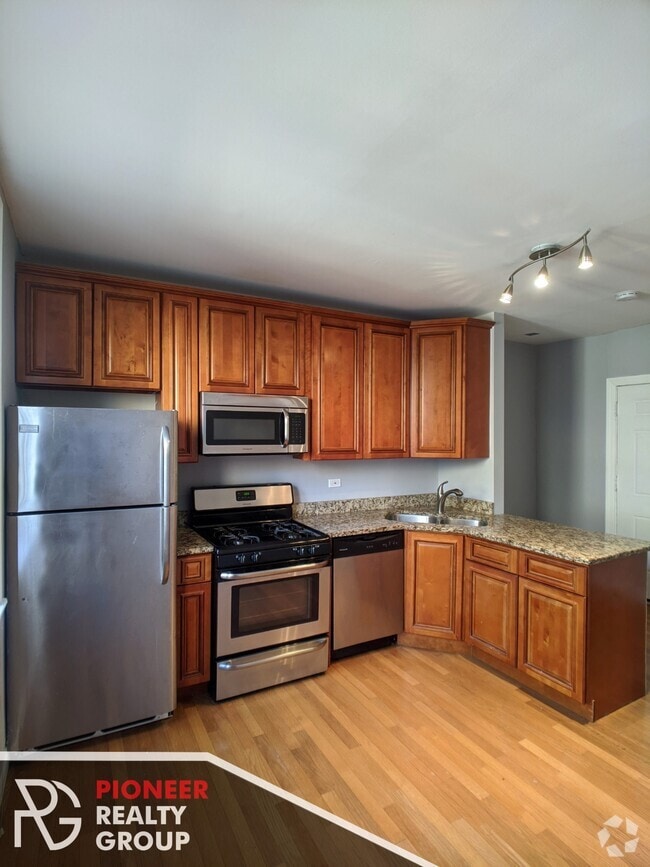 Building Photo - 5029 N Harding Ave Unit 2 Rental
