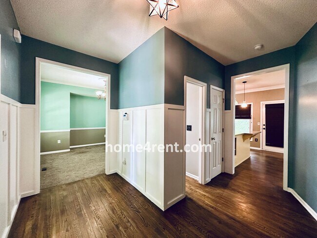 Photo - Blue Valley Schools w/ Wood Floors, Finished Basement and a Peaceful, Private Fenced Yard!