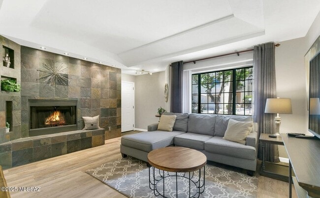 Building Photo - 1200 E River Rd Unit # J124