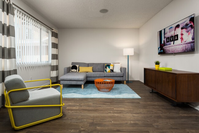 Classic Package II living area with hard surface flooring (select homes)