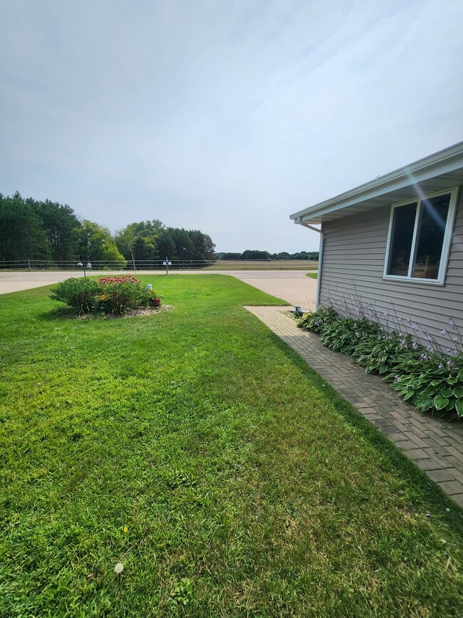 Townhouse (2 bdrm with 2.5 car garage, yard, private basmnt)