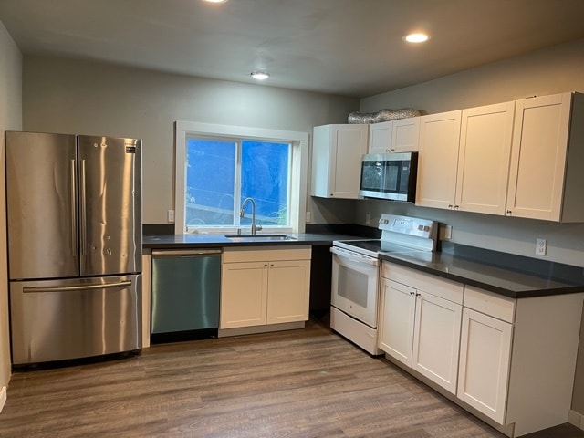 Building Photo - 1220 S Holgate St Unit B 2