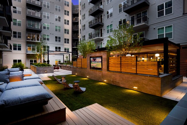 Outdoor movie entertainment area - Modera Clarendon Apartments