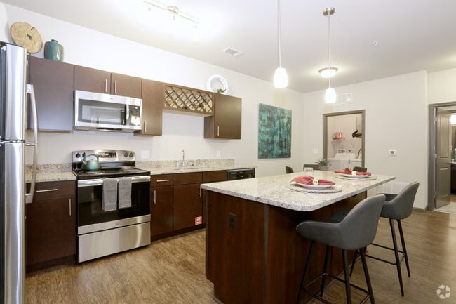 2BR Grand Courtyard - Kitchen - Springs At South Elgin Apartments