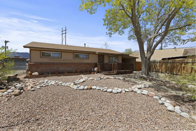 Building Photo - Updated 2 Bed + Bonus Workshop | Huge Backyard | Two Storage Sheds | Carport | Pet Friendly