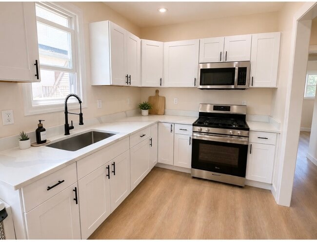 Newly renovated kitchen and new appliances - 246 Stone Ave Unit 3 bedroom 1 bath