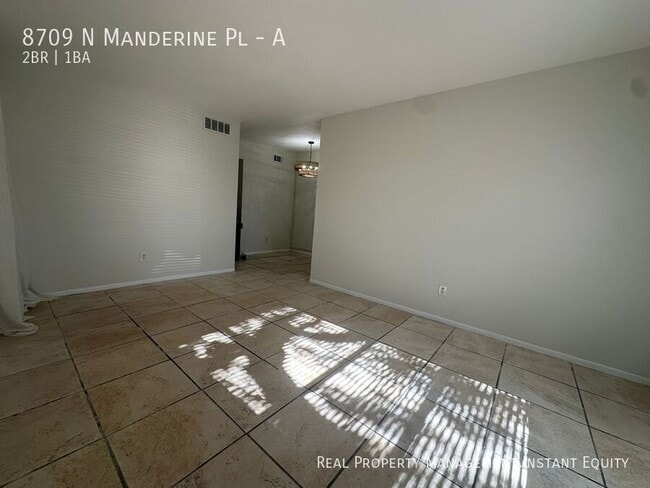 8709 N Mandarine Pl Unit A