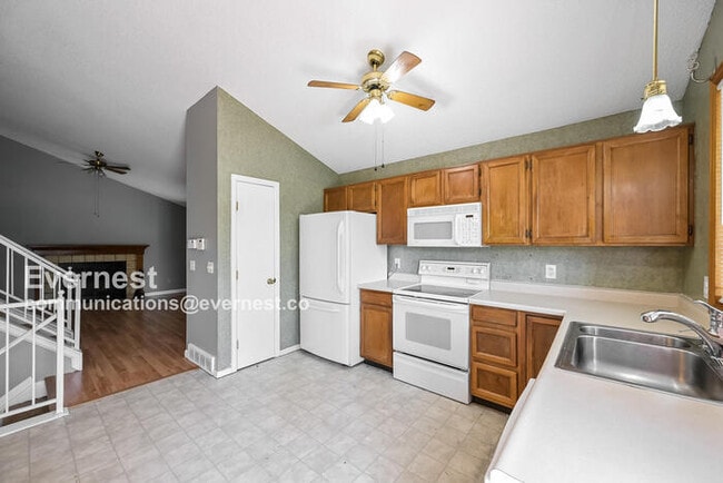 Photo - pacious 3 Bed, 2 Bath Home with Fenced Yard and Two-Car Garage