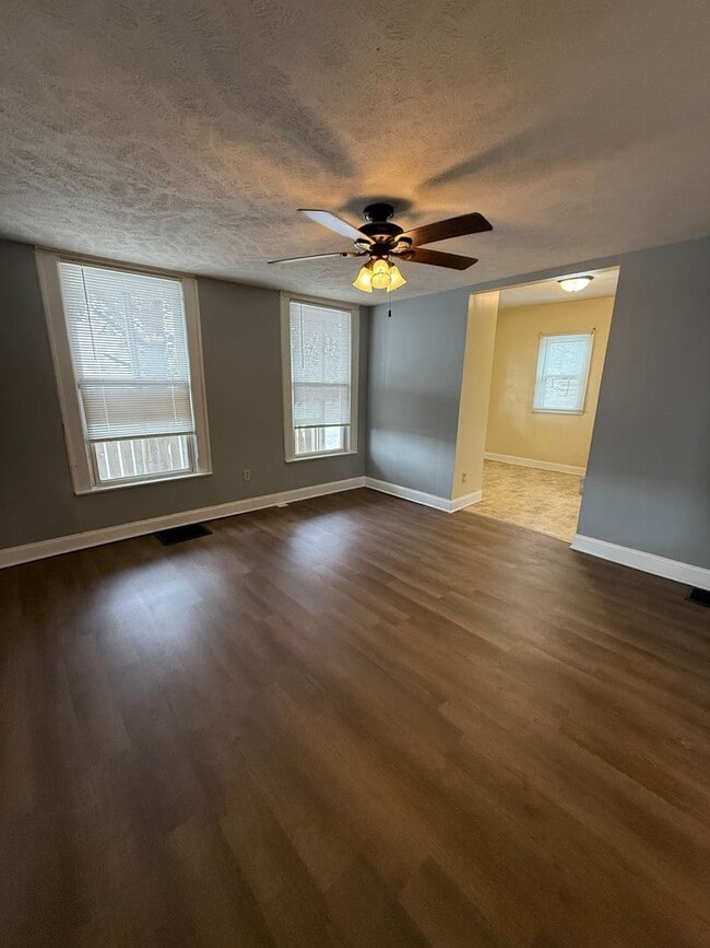 Photo - Spacious 4-Bedroom Home with Huge Fenced Backyard!