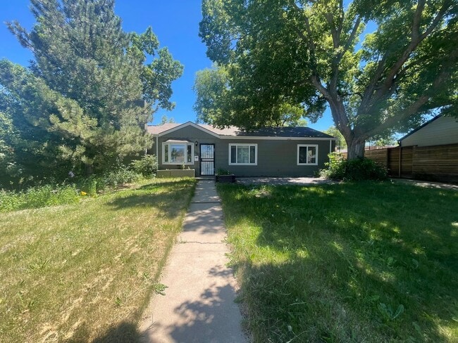Photo - $0 DEPOSIT OPTION. CHARMING 3-BEDROOM HOME WITH LARGE YARD AND EASY ACCESS TO I-25 AND I-225
