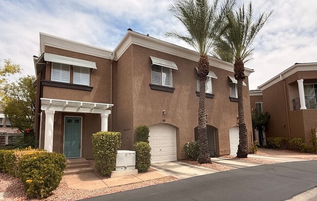 Building Photo - Amazing condominium in gated upscale neigh...
