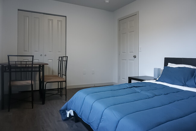 150 sq/ft room with a closet.