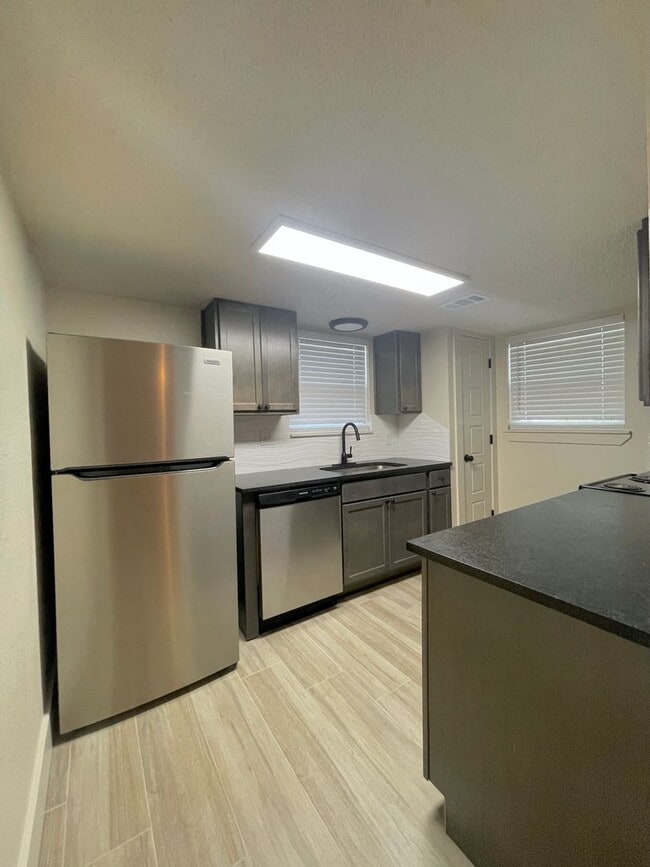 Photo - Location, Location, Location & Beautifully Renovated in 2023 2 Bedroom, 1.5 Bath, 1 Car Garage wi...