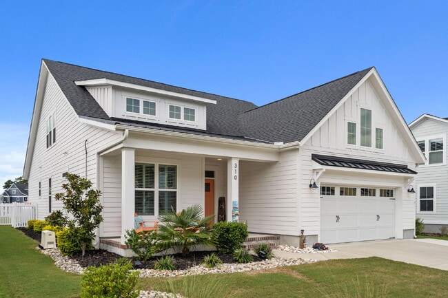 Photo - "Coastal Comfort Awaits: Spacious 3-Bed, 3-Bath Home in Holly Ridge!"