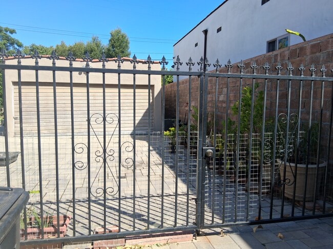 Backyard Entrance - 219 W Ash Ave
