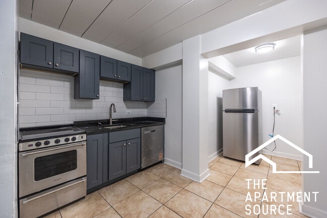 Building Photo - 1360 W Touhy Ave Unit 305