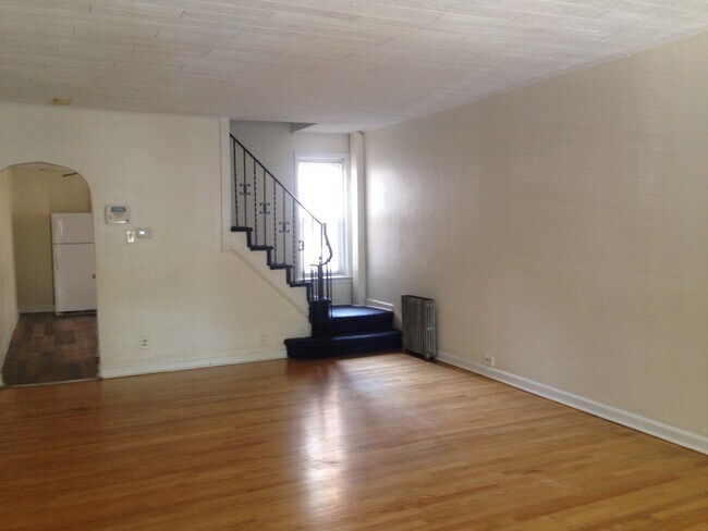 Photo - Great Home! 4 Bedroom House with Spacious Living Area! Full Basement for Storage! W/D Hook-ups! Y...