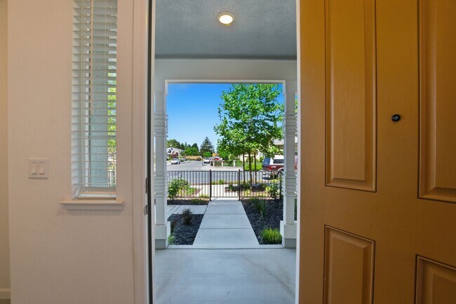 Photo - Spacious 3 Bed Townhome with Garage, A/C & Modern Finishes