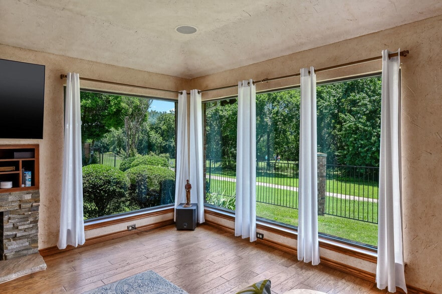 Relaxing view of golf course and greenbelt from living room window