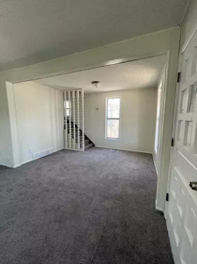 Photo - 319 W American Ave Unit Front