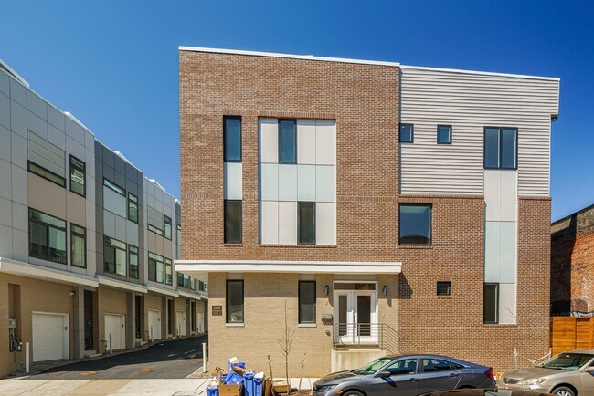 Photo - Stunning 4-Bedroom Townhouse with Garage and Rooftop Deck! Available late May!