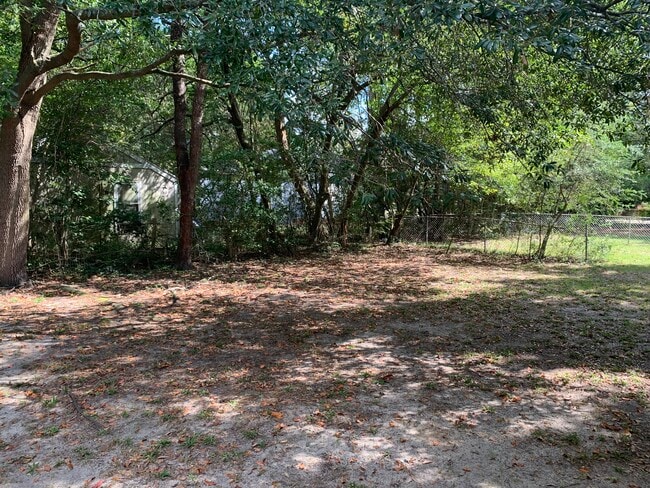 Rear/Side Yard from Screened Porch - 111 Cannon Dr Unit 111 Cannon Drive