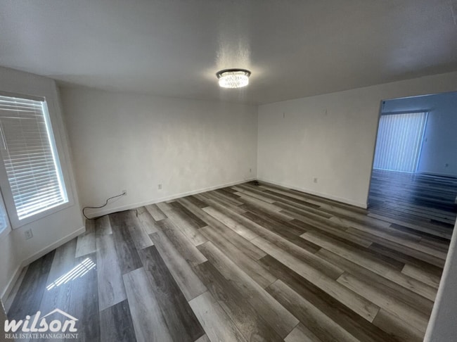 Photo - 3 Bed, 2 Bath Home with a Two-Car Garage, Fenced Backyard, and Lawn Care Included