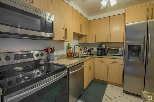 Building Photo - 3675 N Country Club Dr Unit 2202 Rental