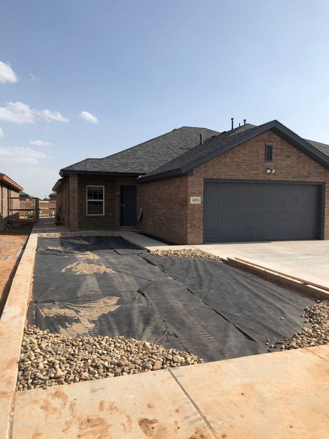 Front of duplex - 1402 16th St Townhome