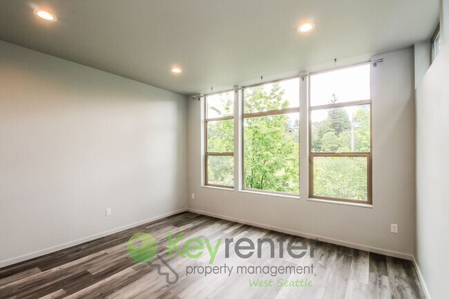 Photo - Modern 3 Bedroom with Rooftop Deck and In Unit Laundry