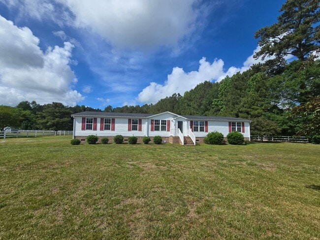 Building Photo - Available in Soon! Quiet Country Living! Spacious 4 Bed, 2 Bath In Currituck