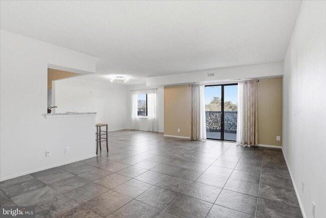 Building Photo - 8340 Greensboro Dr Unit 109