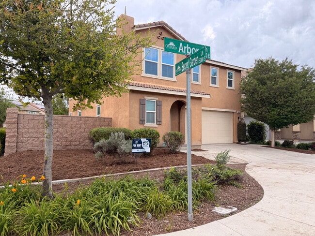 Building Photo - New flooring & paint!  Large backyard - landscaped and ready for garden!   Community pool, fitnes...