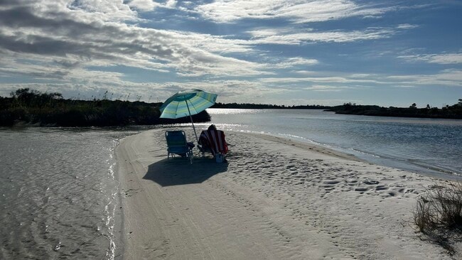 Building Photo - 209 W Miracle Strip Pkwy Unit APT F104