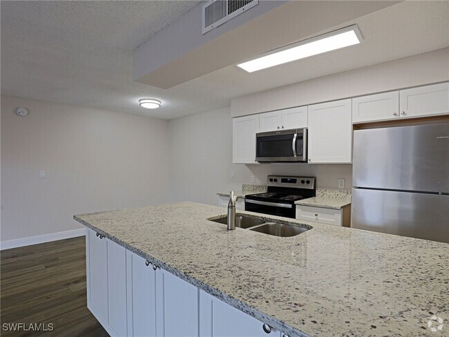 Building Photo - 5327 Summerlin Rd Unit 2716 Rental