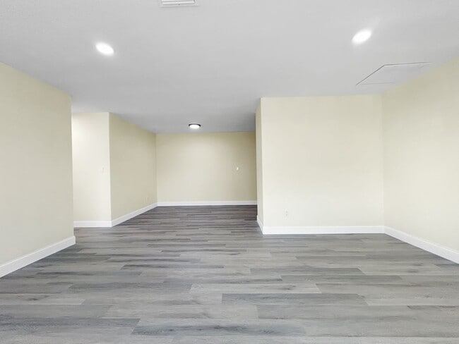 Photo - Beautifully Renovated 2BR/2BA with bonus room New Hurricane Windows + Backyard