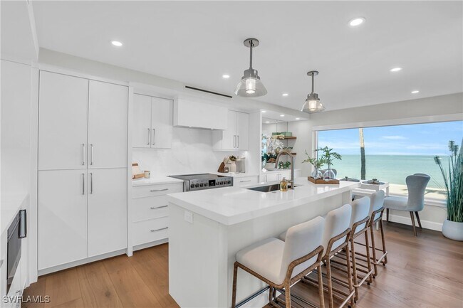 Building Photo - 9517 Gulf Shore Dr Unit 202