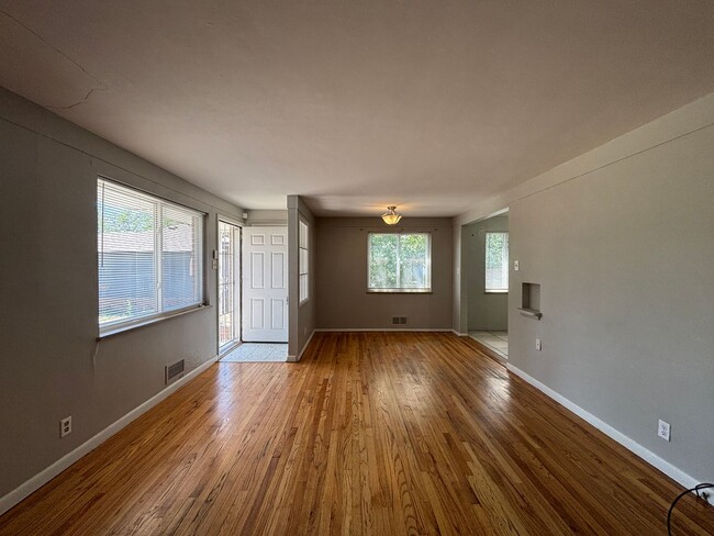 Photo - 2 bedroom, 1 bath duplex with hardwood floors. Off-street parking!