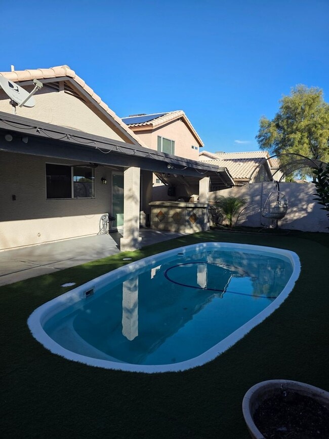 Photo - Beautiful 3BR 2BA Home w/ Private Pool • Pool + Covered Patio • Attached Garage in Phoenix