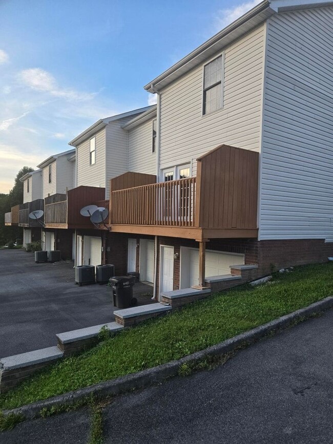 Photo - Spacious 2-Bedroom Townhome – End Unit with Private Deck & Garage