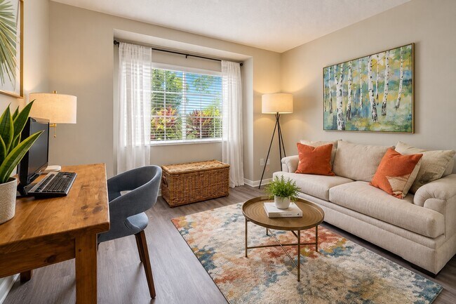 Step into stylish comfort at Club Mira Lago. This inviting living space features abundant natural light, contemporary décor, and cozy furnishings perfect for relaxation and entertaining. Embrace a lifestyle you're proud to call home—schedule a visit today!
