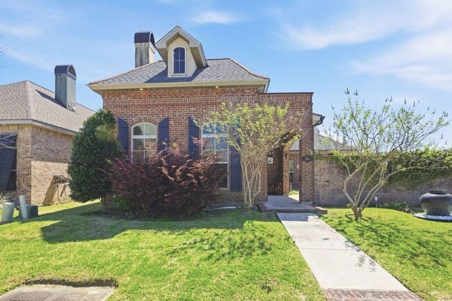 Building Photo - 1549 L'Acadie Dr