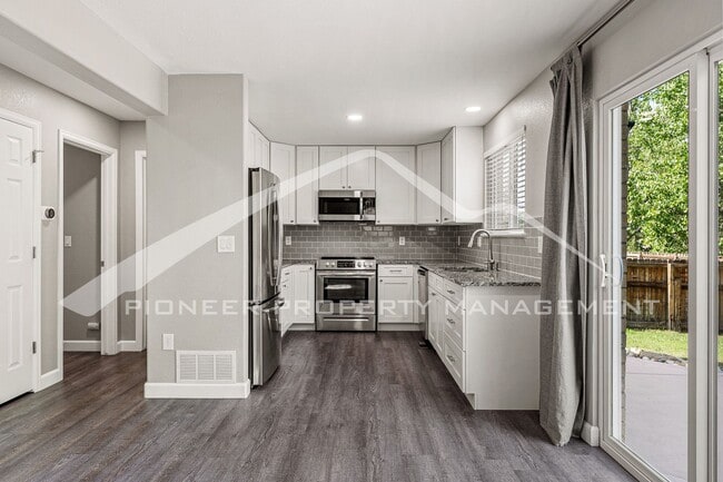 Photo - Single Family Home with 2 Car Garage and Central Air!