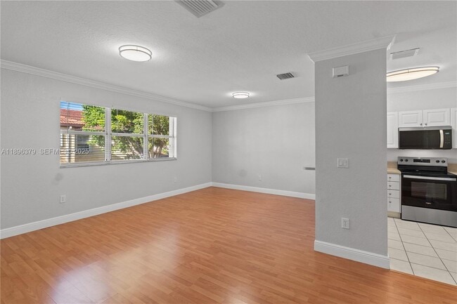 Building Photo - 1398 NE 33rd Ave Unit 201-25
